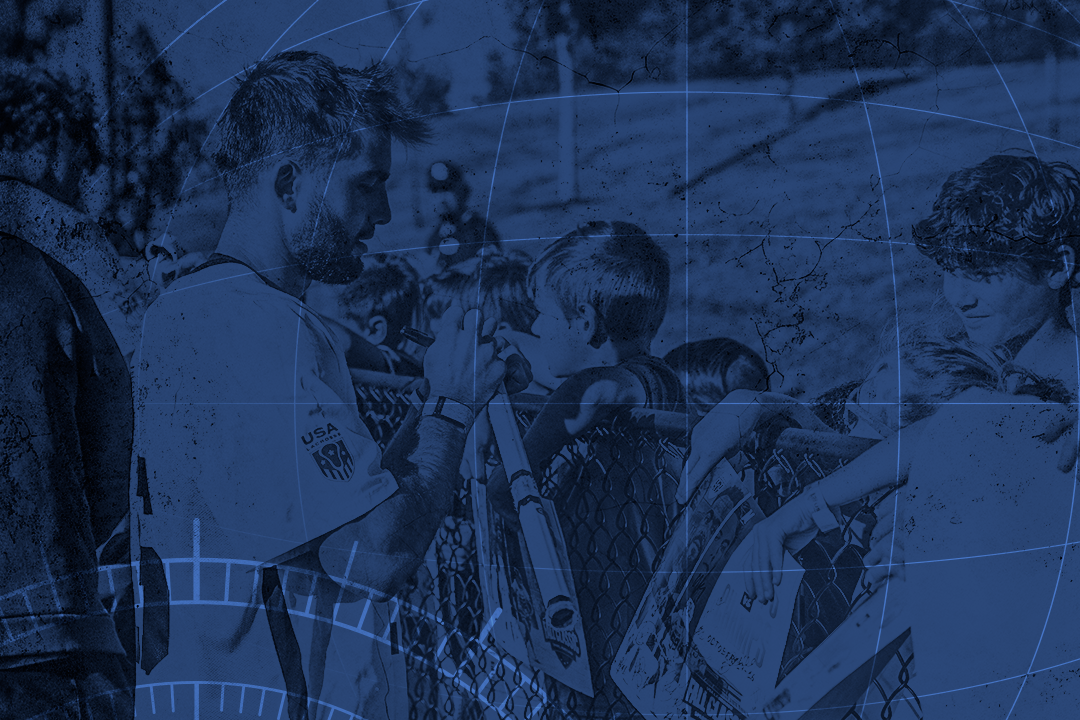 Grant Ament signs an autograph after a USA game